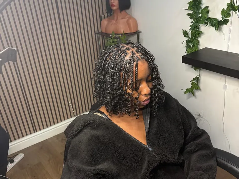 Bob-length boho knotless braids with curled ends